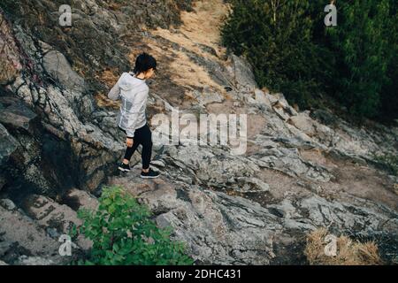 High angle view of female athlete descending hill Stock Photo