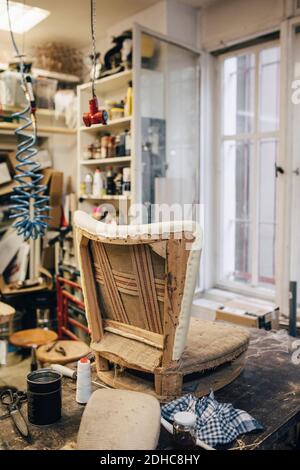 Incomplete chair in upholstery workshop Stock Photo