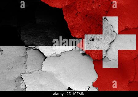 Flags of Fribourg canton and Switzerland painted on cracked wall Stock ...