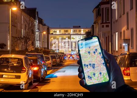 Symbolic image of residential burglary, burglar radar app, shows burglaries in the city, the last few days, residential street, many apartment buildin Stock Photo
