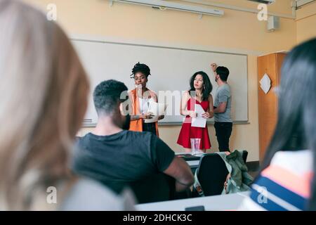 Multi-ethnic teachers teaching students in language school Stock Photo