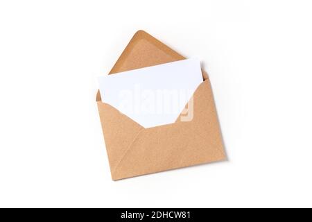 Greeting card in a brown kraft envelope mockup, shot from above on a white background Stock Photo