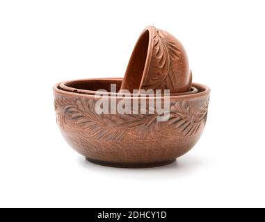 Brown clay plate isolated on white background Stock Photo