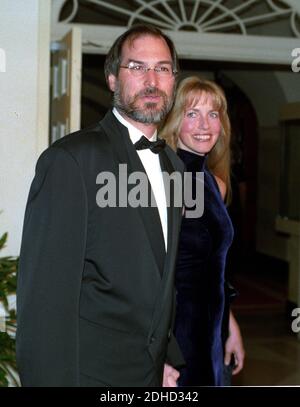 Steven Jobs, interim CEO, Apple Computer, and his wife, Laurene Powell Jobs, arrive at The White House in Washington, DC, USA, on October 29, 1997 for the State Dinner honoring Chinese President Jiang Zemin. Photo by Ron Sachs / CNP/ABACAPRESS.COM Stock Photo