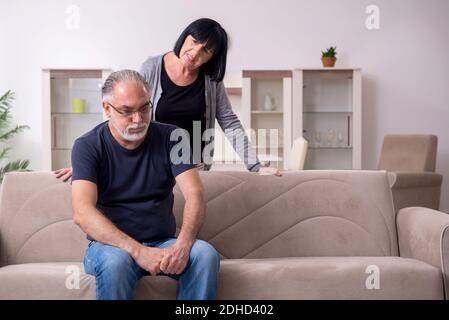 Old couple having argument at home Stock Photo