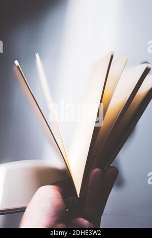 old open notebook with separate sheets Stock Photo