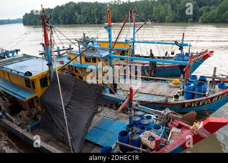 Kuala Sepetang, Malaysia- 27 Oct, 2018: The Kuala Sepetang Jetty with boats, and seafoods restaurant is a famous tourists stop, Perak, Malaysia. - Sce Stock Photo