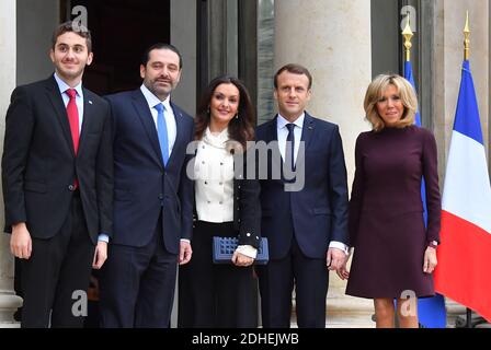 French President Emmanuel Macron and his wife Brigitte Macron stand prior  to welcome Lebanese Prime Minister at the Elysee Presidential Palace on  November 18, 2017 in Paris, France. Saad Hariri, who made