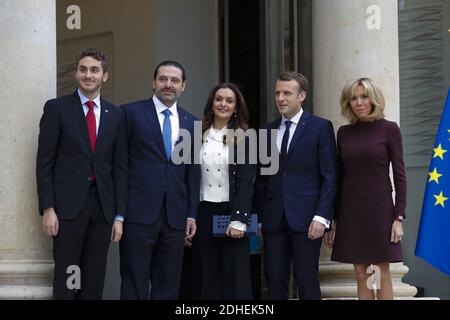 French President Emmanuel Macron and his wife Brigitte Macron stand prior  to welcome Lebanese Prime Minister at the Elysee Presidential Palace on  November 18, 2017 in Paris, France. Saad Hariri, who made