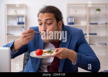 Young businessman working in the office Stock Photo