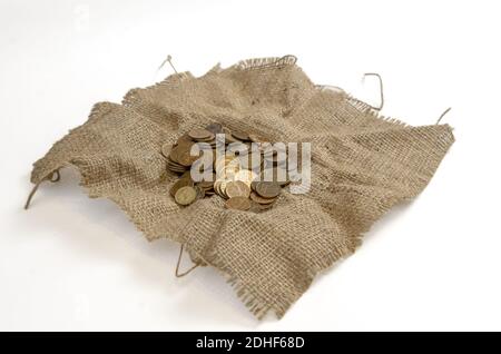 Old coins on a flap of fabric Stock Photo