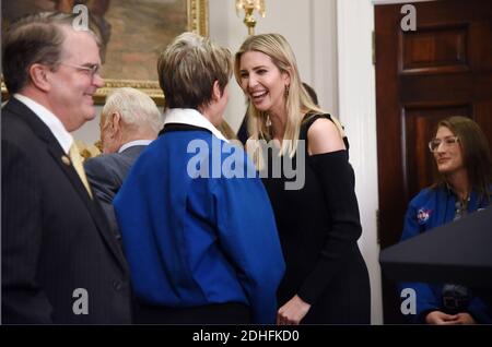 Ivanka Trump speaks with NASA Astronaut Peggy Whitson during a signing ceremony to reinstate the National Space Council and send American astronauts back to deep space during an event in the Roosevelt Room of the White House , December 11, 2017 in Washington, DC. Photo by Olivier Douliery/Abaca Press Stock Photo