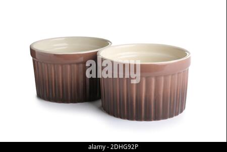 Ceramic ramekins on white background Stock Photo