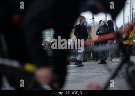 Ljubljana, Slovenia. 10th Dec, 2020. People wearing face masks wait in line to enter the post office in Ljubljana, Slovenia, Dec. 10, 2020. Credit: Zeljko Stevanic/Xinhua/Alamy Live News Stock Photo