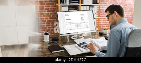 Chartered Tax Accountant Using Modern Invoice Billing Software Stock Photo