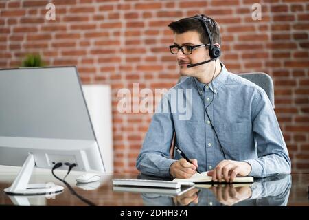 Virtual Personal Assistant Man Making Video Conference Call Stock Photo