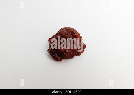 Red and spicy red pepper paste on white background Stock Photo