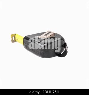Black construction roulette isolated on a white background. Measuring tool close-up Stock Photo