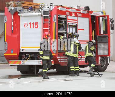 Rome, RM, Italy - May 30, 2019: Italian firefighters with the fire truck during an emergency Stock Photo