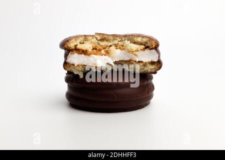 Chocolate coated pie on white background Stock Photo