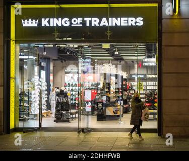 Glasgow, Scotland, UK. 11th Dec, 2020. Pictured: JD retail shop open for business in Glasgow's Argyle Street. Glasgow City Centre streets look a little business than yesterday, however still very empty considering Glasgow has finished phase 4 and entered phase 3 lockdown today of the coronavirus (COVID19) pandemic. Credit: Colin Fisher/Alamy Live News Stock Photo