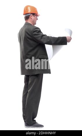 side view. man with a roll of drawings looking at you. Stock Photo