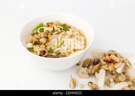 Seafood kalguksu on white background Stock Photo