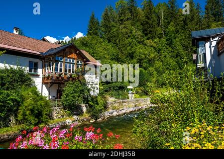Picturesque Houses Beneath Mountain River In Bad Aussee In Austria Stock Photo