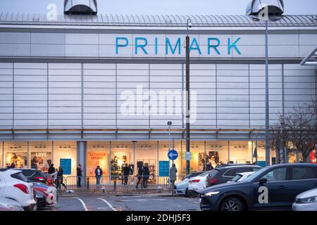 Glasgow, Scotland, UK. 11th Dec, 2020. Pictured: First day of all non-essential shops being able to open back up to the public since the region was placed into phase 4 lockdown, however since this morning, phase 3 is now active meaning that non-essential retail shops such as Primark has been busy with long queue of customers waiting to get in and grab a last minute Christmas bargain. Credit: Colin Fisher/Alamy Live News Stock Photo