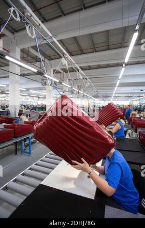 Female workers at Samsonite new assembly plant in Szekszárd near the Hungarian capital, Budapest. Stock Photo