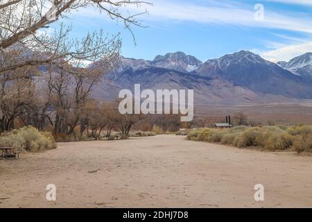 INDEPENDENCE, CALIFORNIA, UNITED STATES - Dec 06, 2020: The Eastern Sierra Nevada mountains line the background of the landscape at Taboose Creek Camp Stock Photo