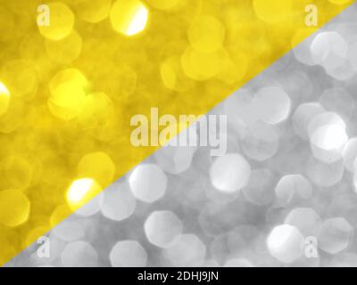 Trendy color of year 2021. Sparkling background made of yellow and gray colors. Color of year 2021 blurred backdrop for holidays and parties. Copy space Stock Photo