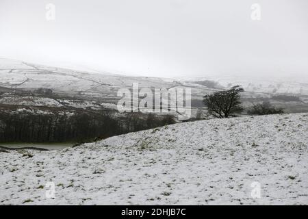 Pictured is a snowy scene in the Yorkshire Dales above Hawes. weather snow winter snowing Stock Photo
