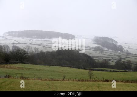 Pictured is a snowy scene in the Yorkshire Dales above Settle. weather snow winter snowing Stock Photo