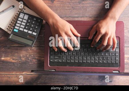 top view of man hand typing on laptop. Stock Photo