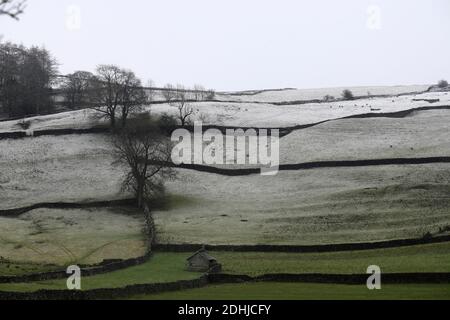 Pictured is a snowy scene in the Yorkshire Dales above Settle. weather snow winter snowing Stock Photo
