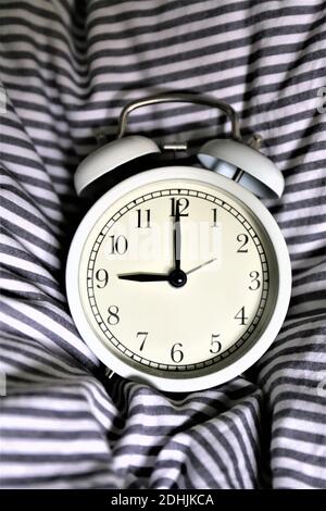 alarm clock on the table Stock Photo