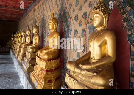 Statues of Buddha WAT ARUN: Temple of the Dawn in Bangkok, Thailand Stock Photo