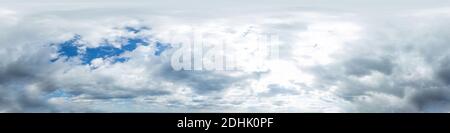 Seamless panorama of sky with puffy Cumulus clouds in spherical equirectangular format with complete zenith for use in 3D graphics, game and Stock Photo