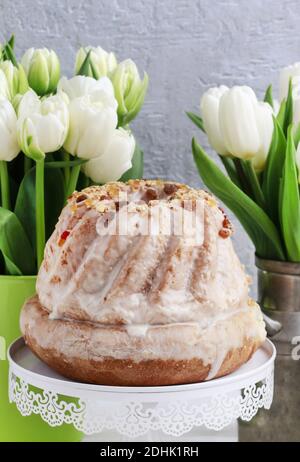 Easter table with cakes, eggs and flowers. Festive breakfast Stock Photo