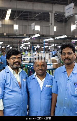 Male workers at Samsonite manufacturing unit in India Stock Photo