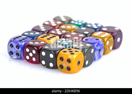 Deutschland. 08th Dec, 2020. The die is cast". Colorful dice in a row with a slight reflection on the ground in front of a neutral background. | usage worldwide Credit: dpa/Ģ����ý Live News Stock Photo