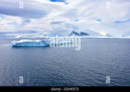 A beautiful blue iceberg floating off Antarctica. Stock Photo