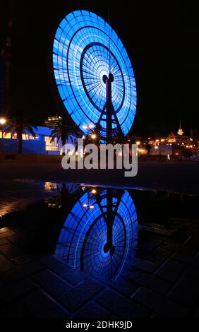 ferris wheel change color at night in japan at kobe Stock Photo