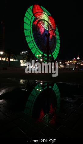 ferris wheel change color at night in japan at kobe Stock Photo