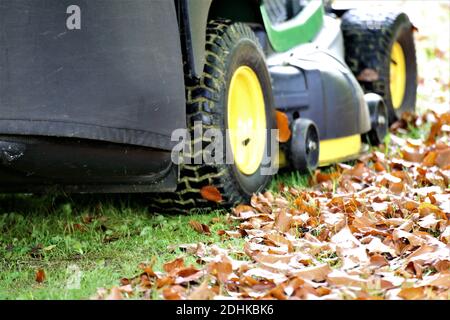lawn mower on green grass Stock Photo