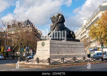 Lion of Belfort statue at Denfert Rochereau square - Paris Stock Photo