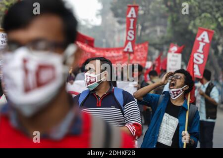 Kolkata, India. 11th Dec, 2020. A protester chants slogans in the crowd during the demonstration.Activists of AISA (All India Students' Association) staged a protest rally against NRC (National Register of Citizens), CAA (Citizenship Amendment Act) & Farm bill. Credit: SOPA Images Limited/Alamy Live News Stock Photo