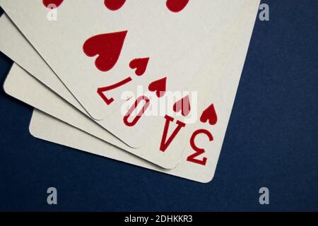 Fan of playing cards on a table Stock Photo