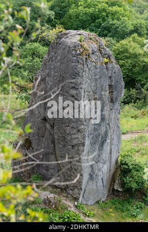 Rock pillar in front of the rock face at Stenzelberg from above against the green of the environment. Stock Photo